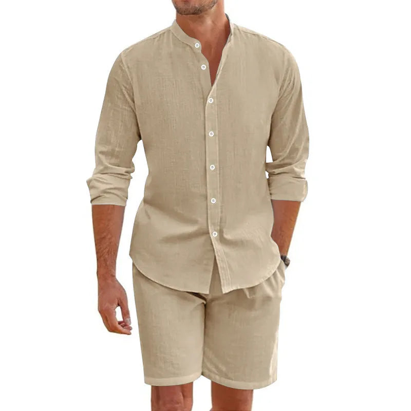 Men's dark grey linen blend short sleeve shirt and drawstring shorts set laid flat.