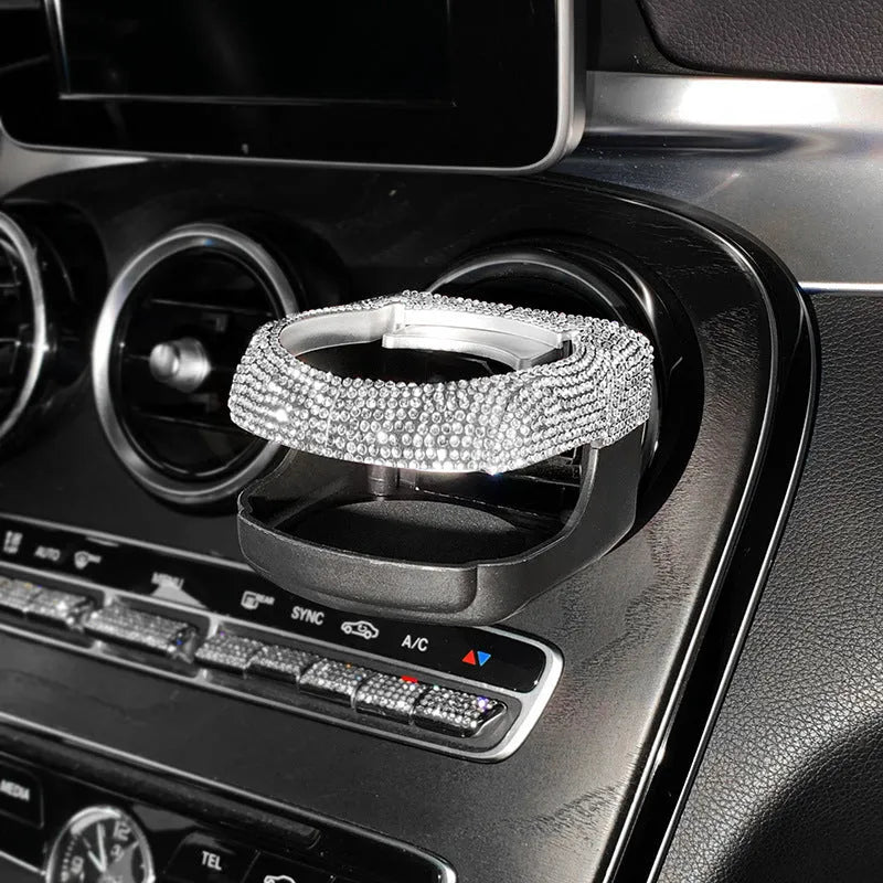 White rhinestone-decorated car cup holder bracket mounted on a car air vent
