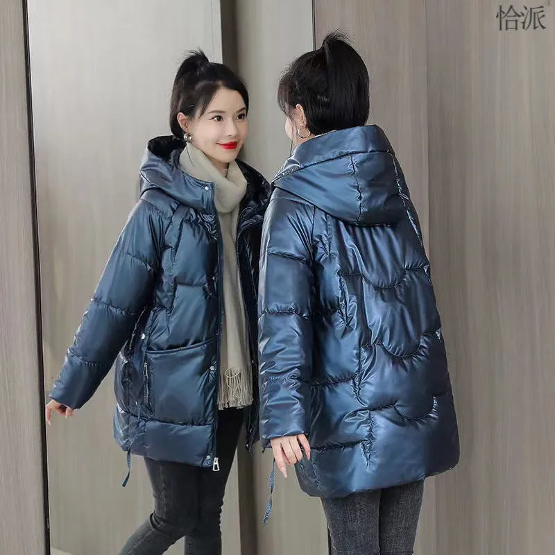 Women's loose thick winter hooded jacket in black colour with long sleeves