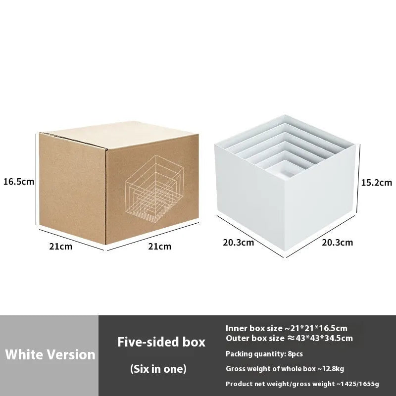 Six identical white plastic cube dessert display stands arranged together.