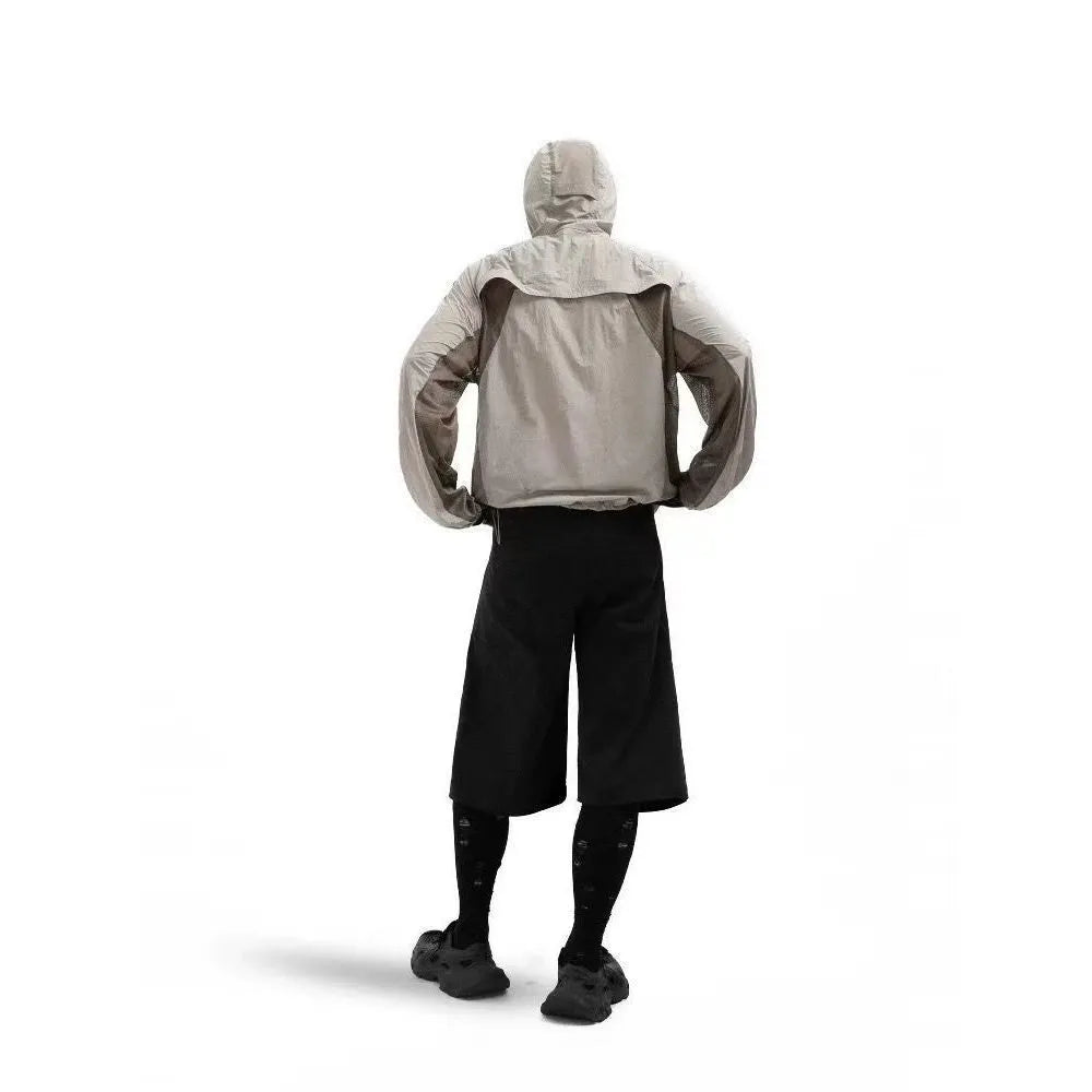 Nylon sun protective clothing with mesh stitching in desert brown colour showing regular length cut