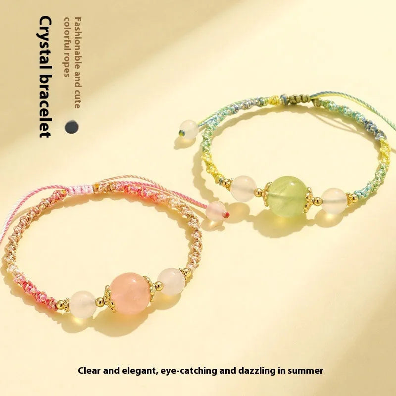 Hand-woven white agate and prehnite couple bracelet with 12mm diamond-shaped beads and electroplated finish on woman's wrist