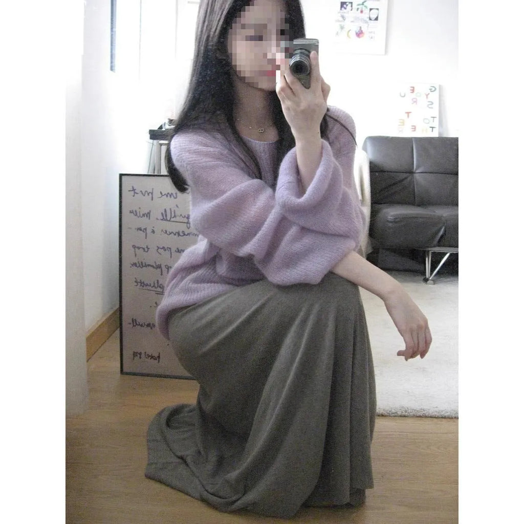 Purple sleeveless blouse with princess sleeves and hollow-out detail, made from lightweight ice silk fabric.