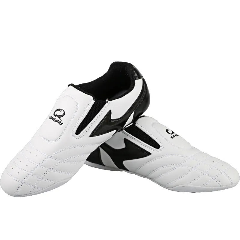 Black and white PU Taekwondo martial arts training shoes with a soft sole.