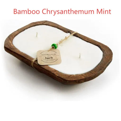 Lavender-coloured wooden basin containing a soy wax aromatherapy candle with three wicks.