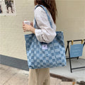Pink Oxford cloth women's shoulder bag with a large main compartment and a black three-dimensional front pocket.
