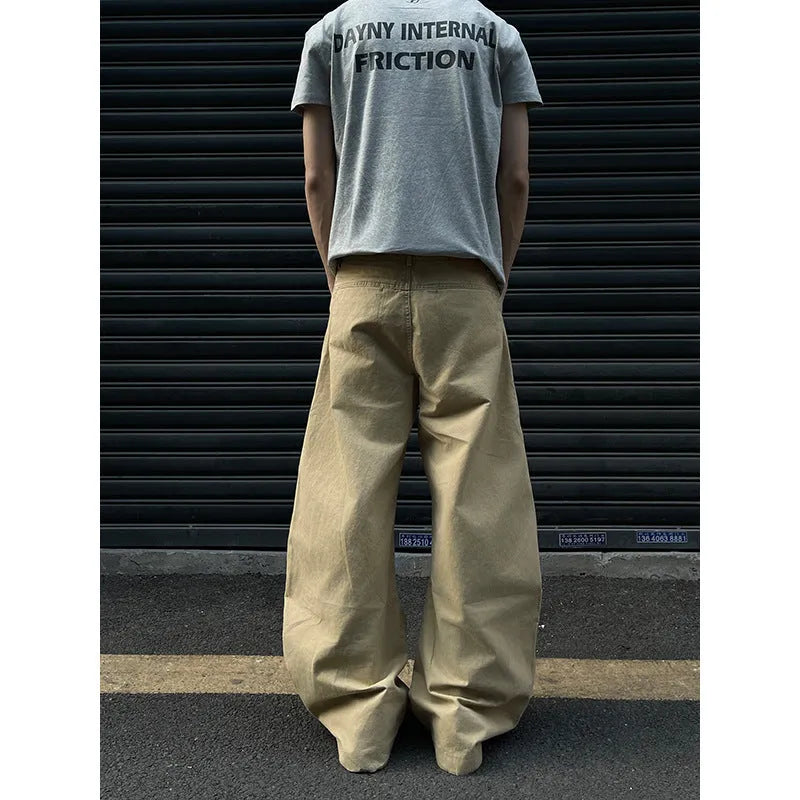 Men's khaki coloured straight-leg cotton casual trousers laid flat