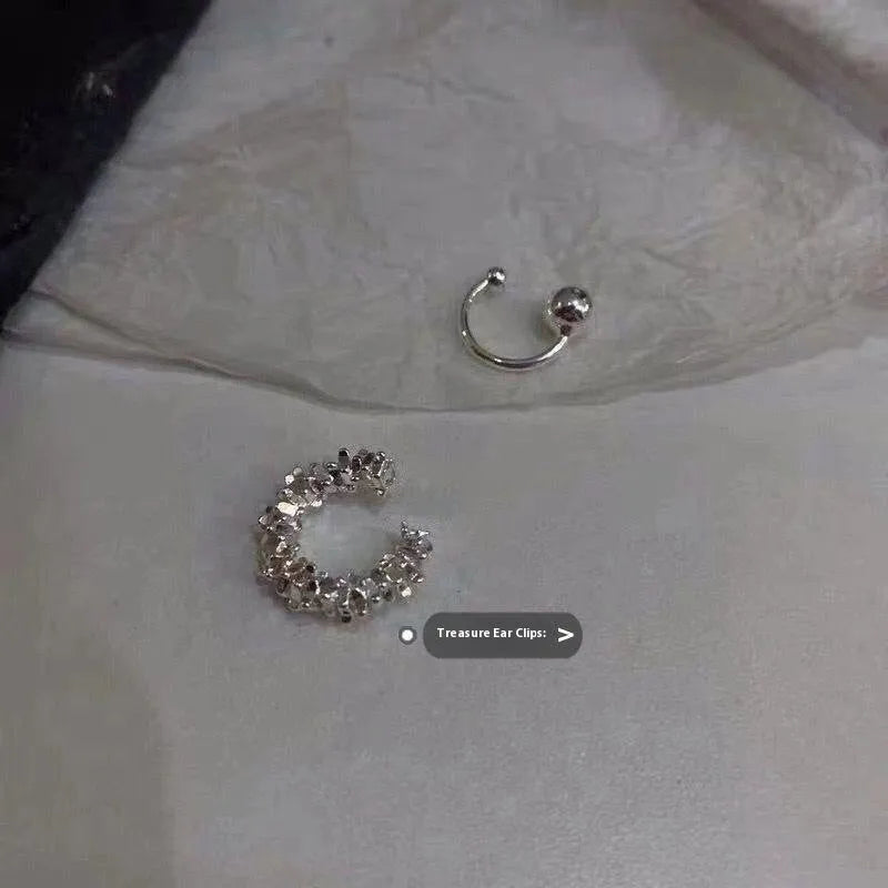 Geometric irregular shaped ear clip earrings with a frosty B4710# finish.