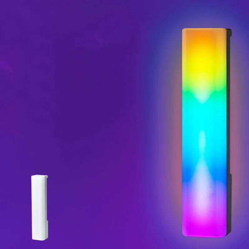 3D RGB music-activated ambiance lamp in black shell on tabletop