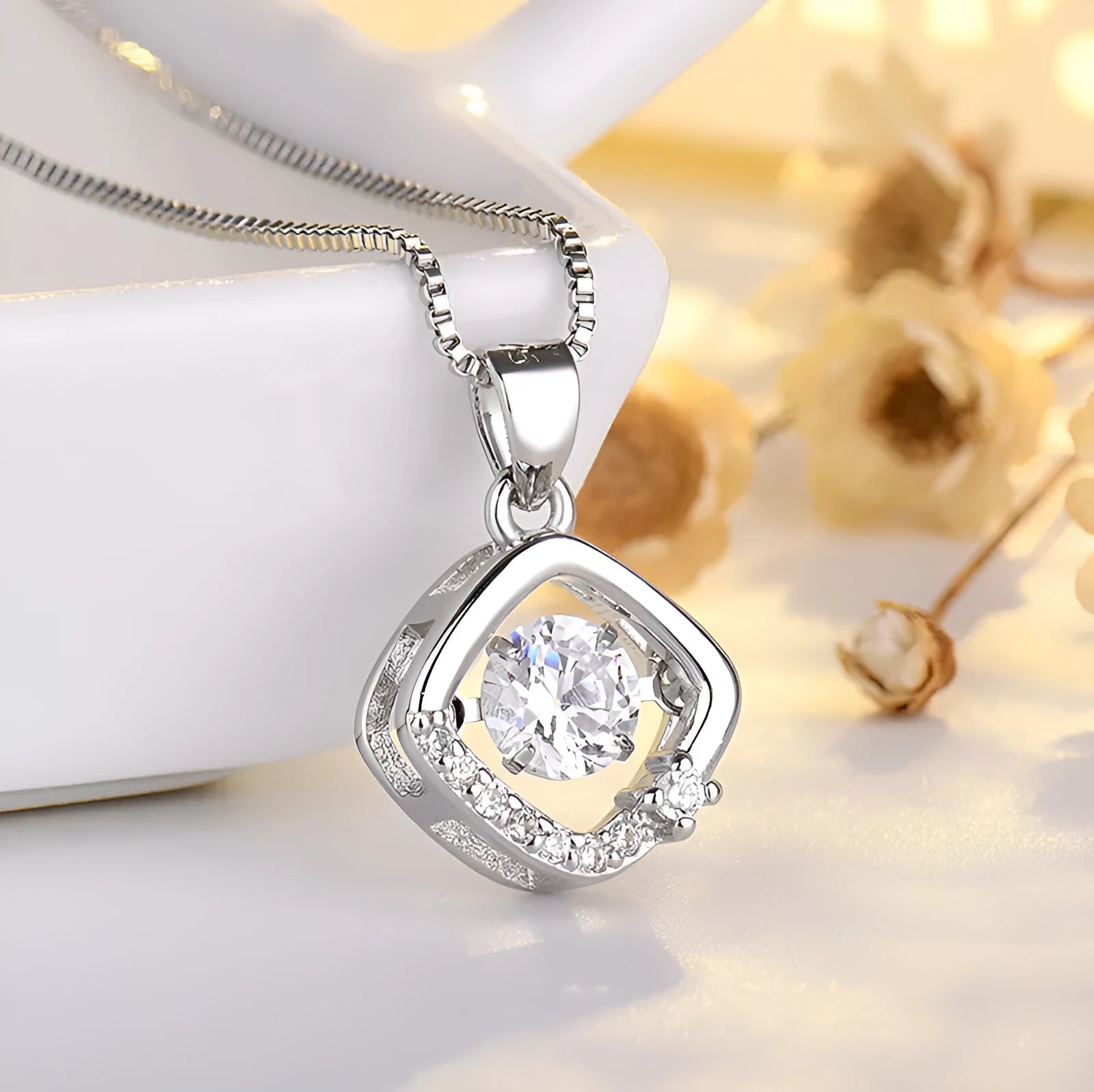 Sterling silver heart necklace with crown and bow charm detail in rose gold or silver finish