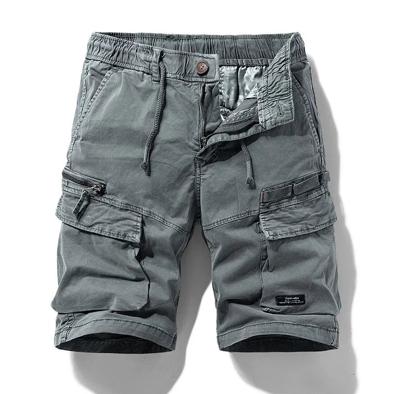 Men's cotton shorts in army green with multiple pockets and zipper closure in Korean style cut