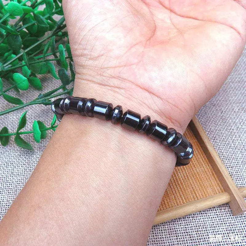 Black pentagram magnetic therapy bracelet with magnetite stones and stretch design for wrist wear