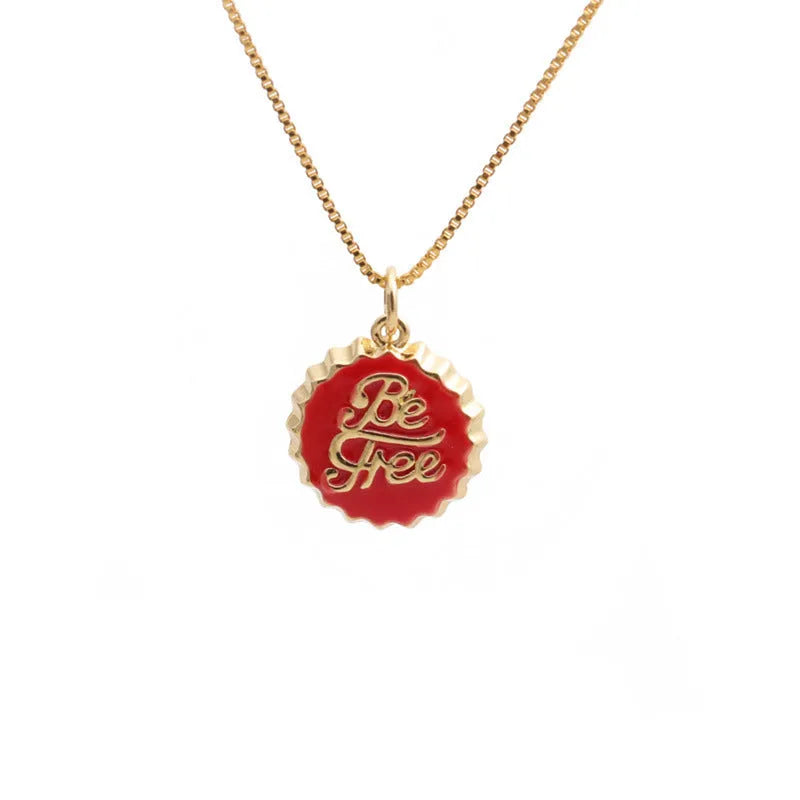 Copper bottle cap pendant necklace on a 40cm box chain with an 18K gold electroplated finish.