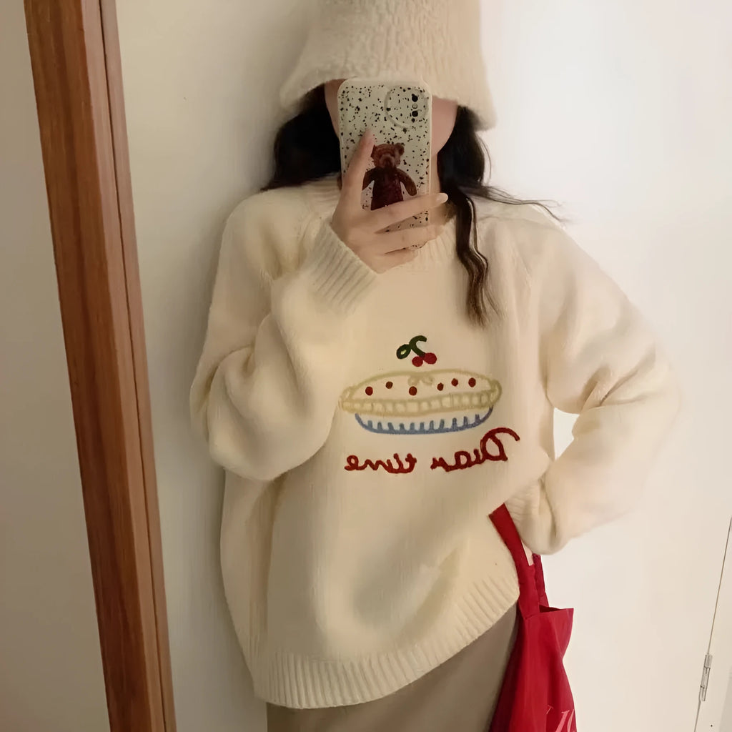 Women's round neck embroidered sweater in loose fit, available in seven colours including beige, gray, red, green, black, and rose red.
