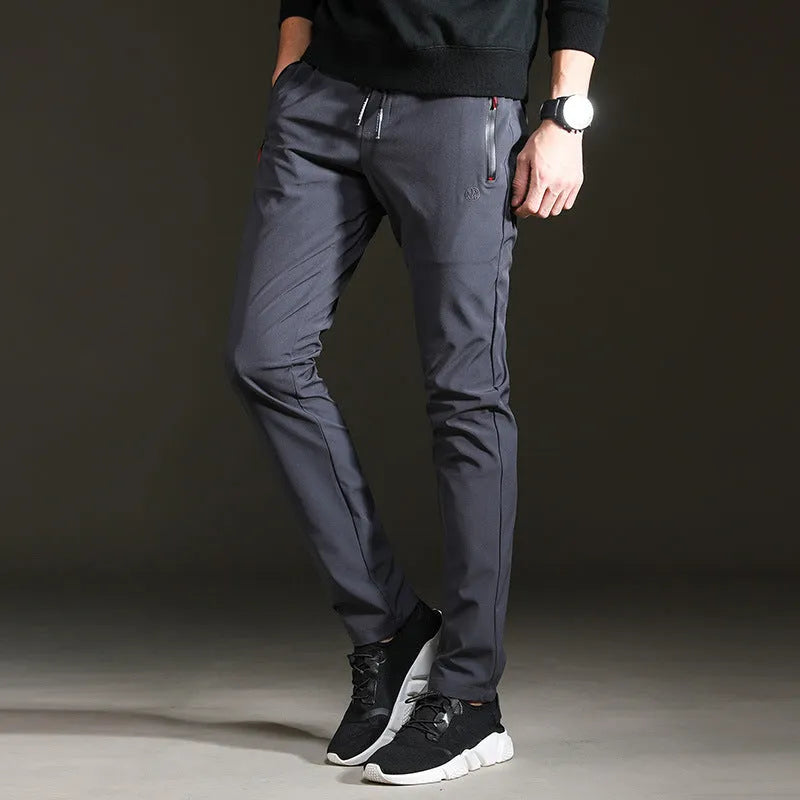 Men's slim cropped sweatpants in black with elasticated waist and relaxed fit, available in multiple sizes up to 5XL