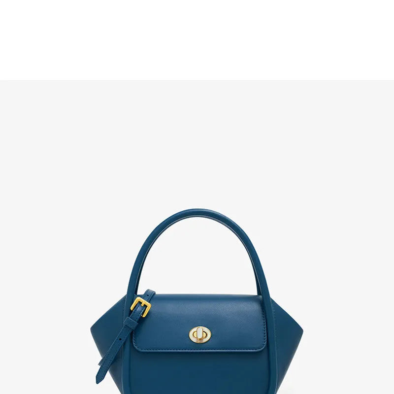 Women's leather wing-shaped tote bag with buckle closure in blue, grey, black, or brown colour options