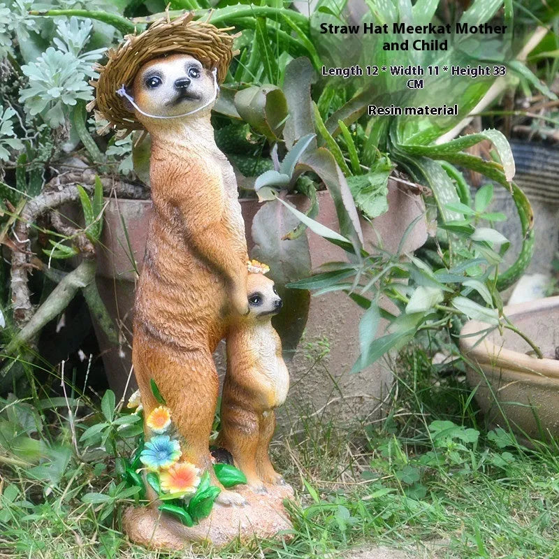 Three resin mongoose garden ornaments with straw hats, including figures holding rake and shovel tools