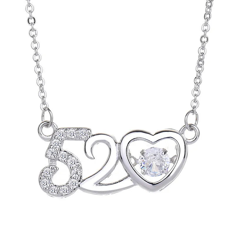 Sterling silver heart necklace with crown and bow charm detail in rose gold or silver finish
