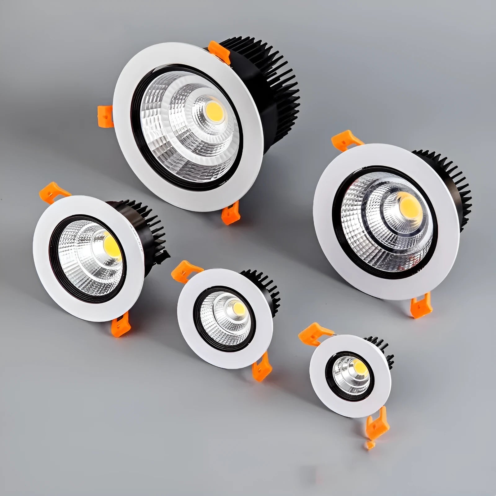 Black aluminium embedded LED ceiling spotlight with anti-glare design showing three colour temperature options