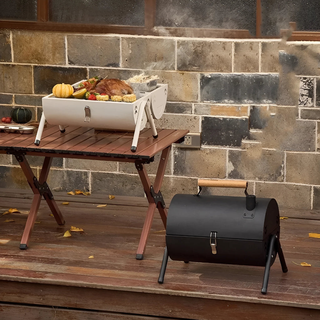 White portable charcoal grill with round chimney oven for frying and baking outdoor cooking