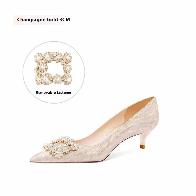 Champagne gold women's high heel pumps with pointed toe and stiletto heel on a plain background.