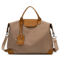 Oxford cloth medium travel bag with lock closure and embroidery, available in multiple colours