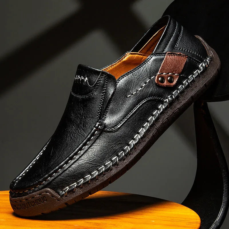 Men's casual leather shoes in black with soft rubber sole, round toe, and low heel