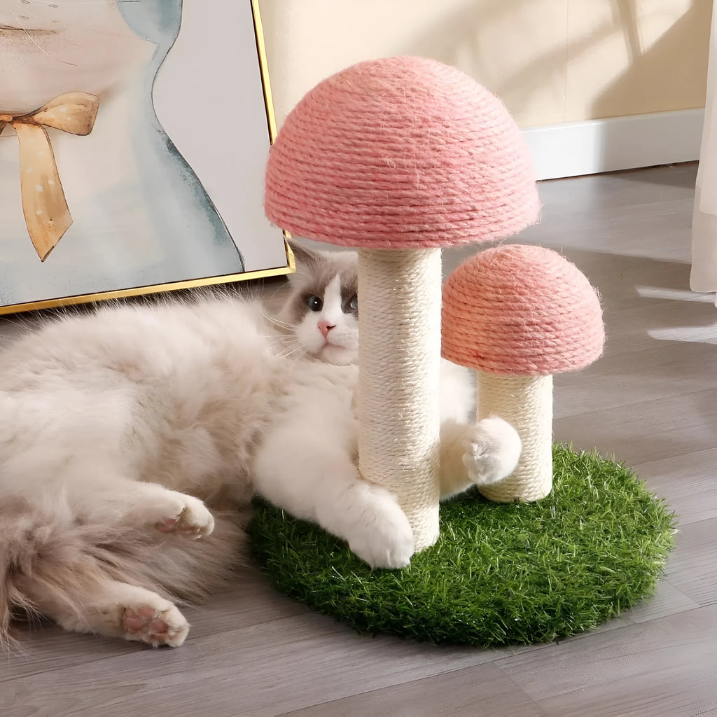 Pink mushroom-shaped cat scratching post with natural sisal caps and pole for kittens