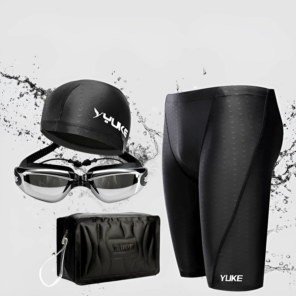 Men's black five-piece swimming set including trunks, goggles, cap, ear plugs, nose clip, and carry bag laid out flat.