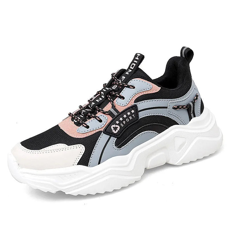 Women's white thick-soled casual sports shoes with mesh upper, round toe, and buckle closure.
