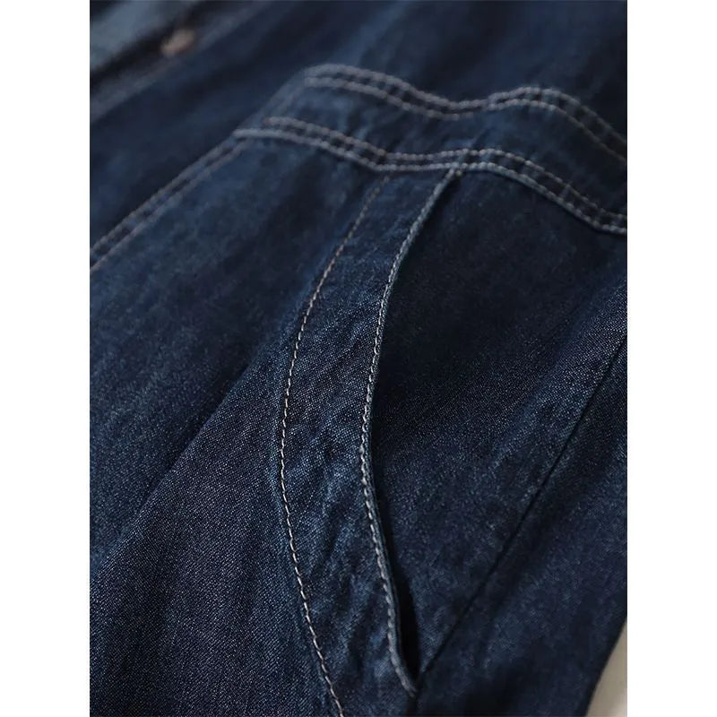 Solid colour hooded denim top in denim blue with large front pocket and long sleeves