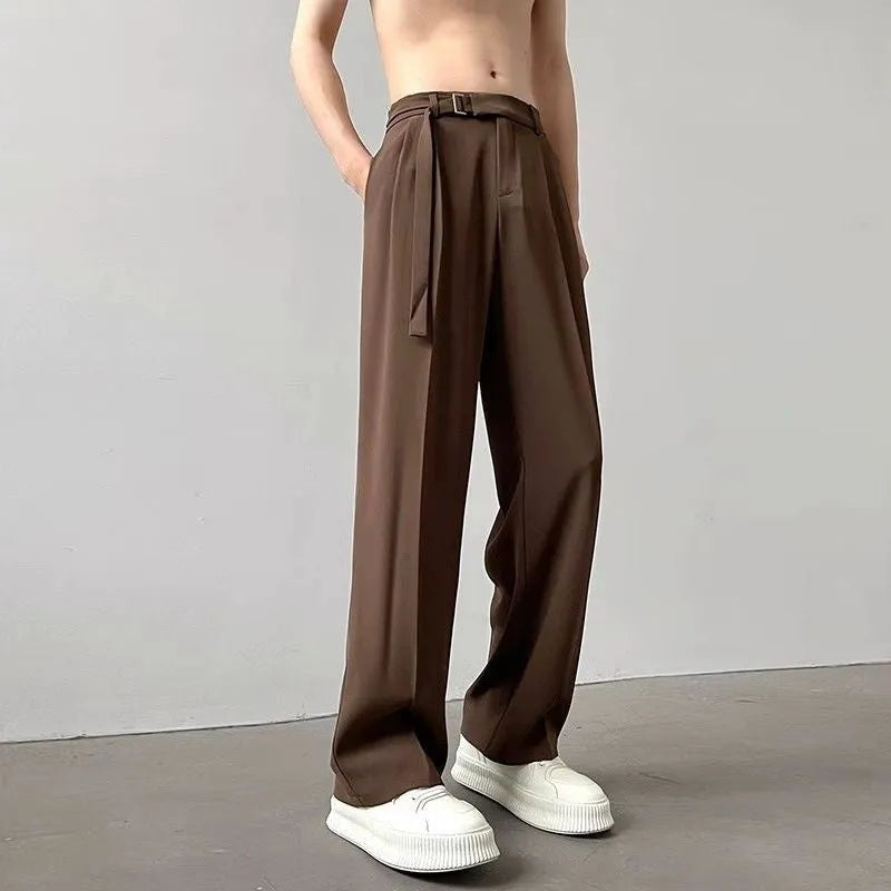 Black loose fit wide leg casual trousers with straight hem on a mannequin.