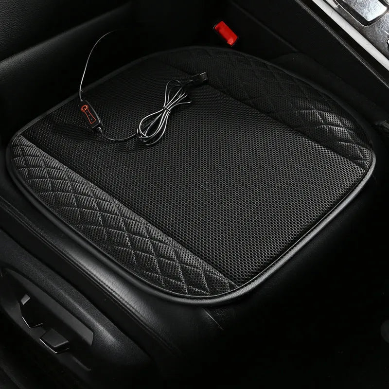 Black USB ventilated car seat cushion with cooling fans on a car seat.