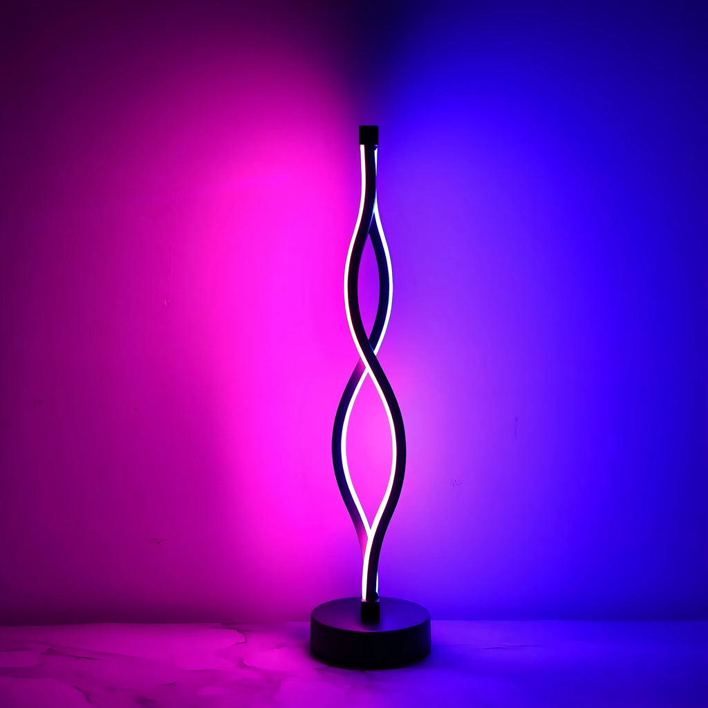 Black aluminium desk lamp with a touch dimming button showing three colour LED lights.