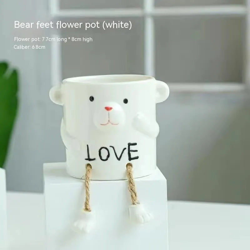Ceramic hanging foot flowerpot with cartoon design in one of twelve colour variants for succulent plants