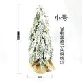 Small 24-inch white Christmas tree with lights and snow-covered branches for desktop decoration