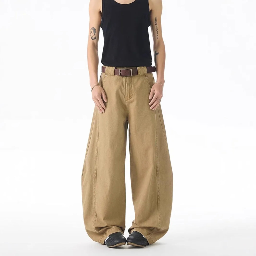 Brown loose fit straight leg men's jeans with a button fly on a mid waist.