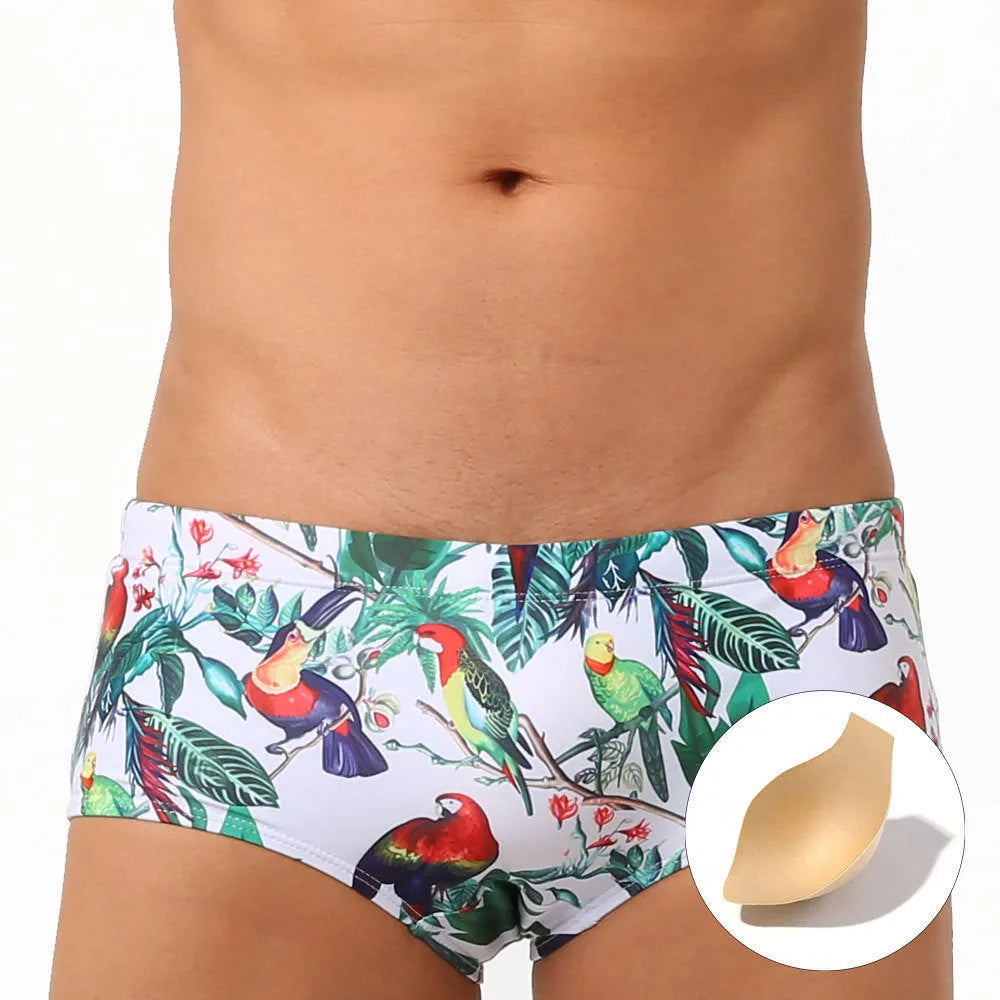 Men's floral and bird print nylon swimming trunks in boxer brief style.