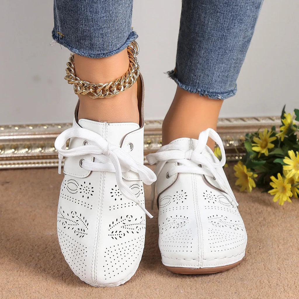 Women's lace-up Baotou slippers with hollow-out wedge design in suede material, available in multiple colours.