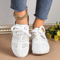 Women's lace-up Baotou slippers with hollow-out wedge design in suede material, available in multiple colours.