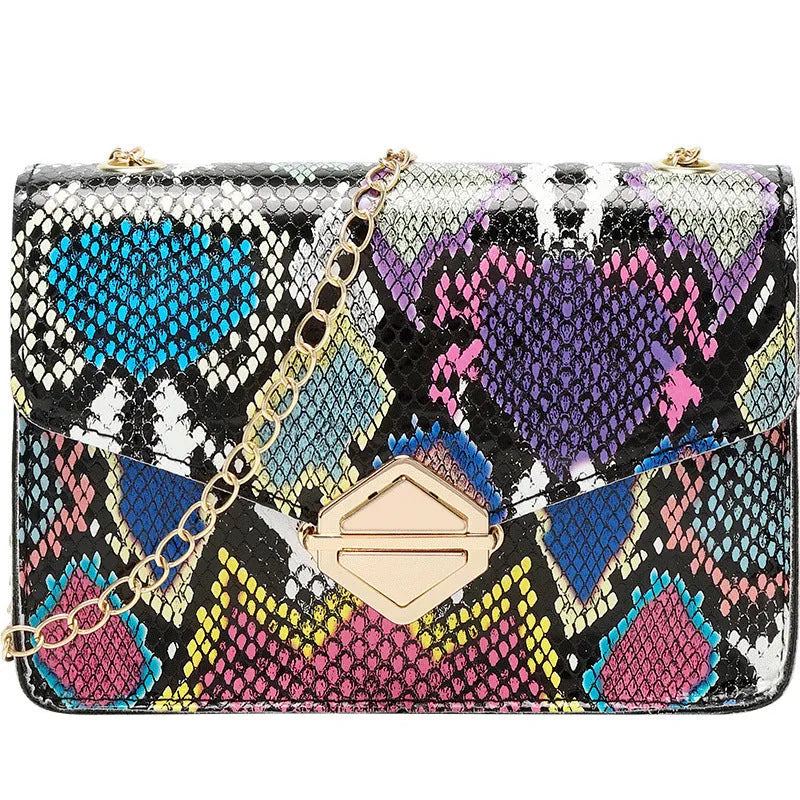 Rainbow Cloud Mist chain bag in light gray, clamshell opening, horizontal square shape, snake chain detail
