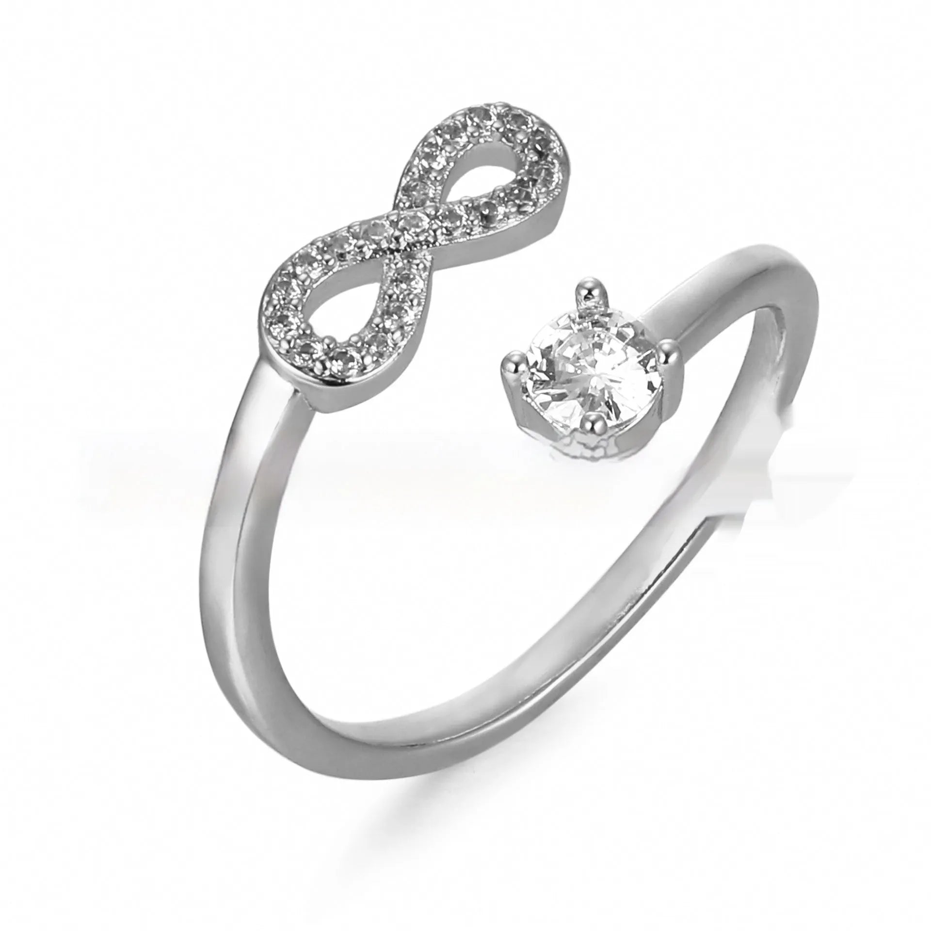 Open geometric ring with zircon stones featuring an English letter, available in gold, rose gold, and silver finishes.