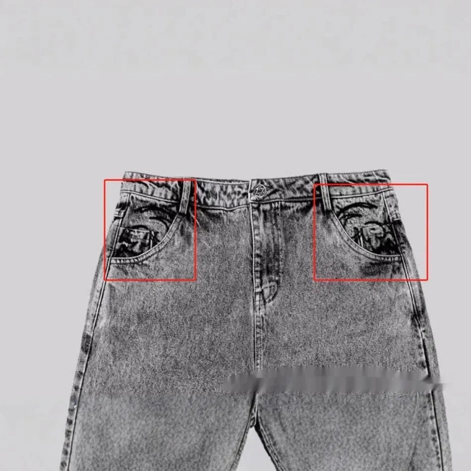 Grey loose fit straight-leg cotton denim trousers on a mid-rise waist mannequin