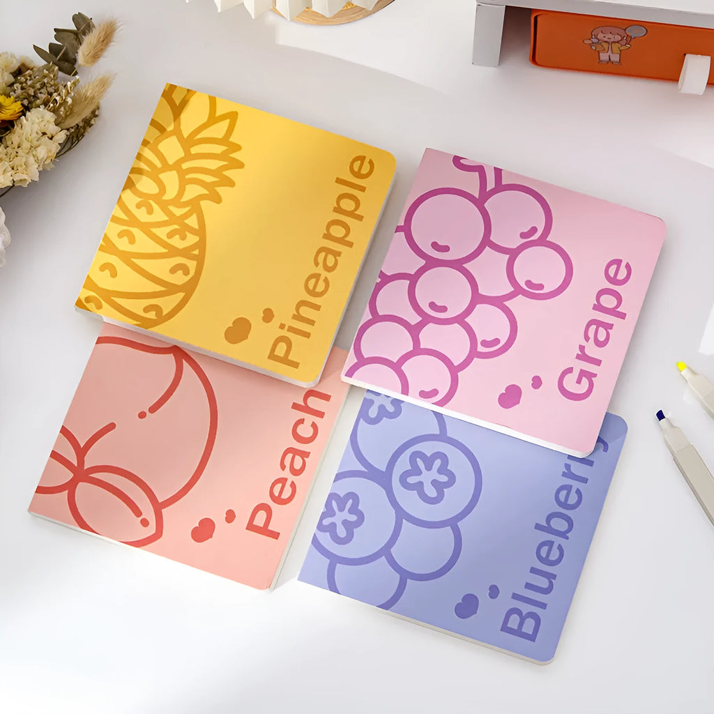 Square fruit design notebook showing embossed pineapple, blueberry, grape, and peach cover options.