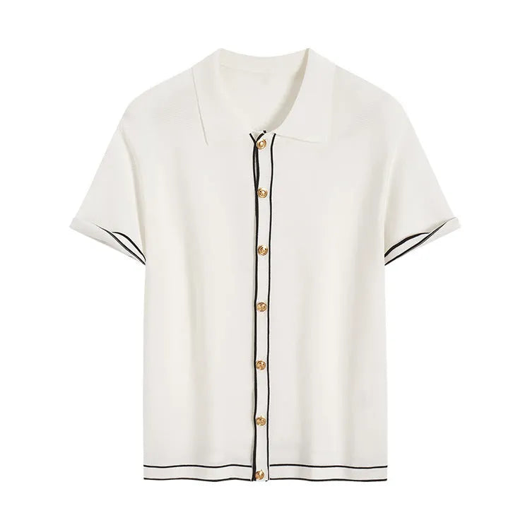 White short sleeve cardigan with dark contrast colour lapels laid flat.