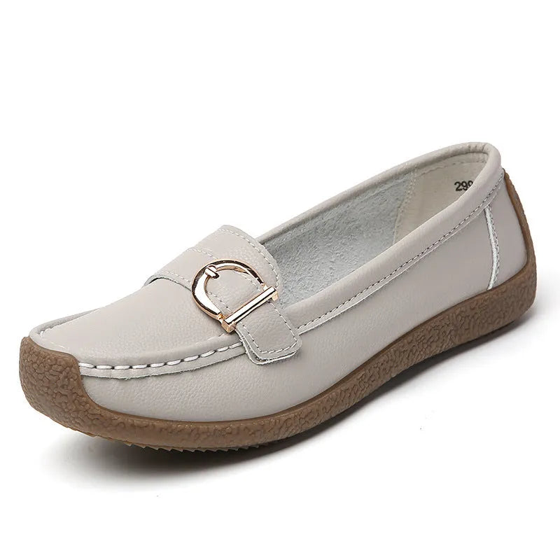 Women's beige casual loafers with a round toe and shallow slip-on design on a soft beef tendon sole.