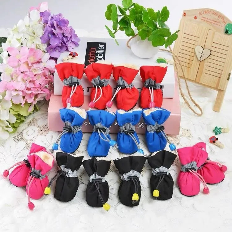 Four seasons breathable cloth dog shoes in multiple colours including fleece-lined red and monkey designs