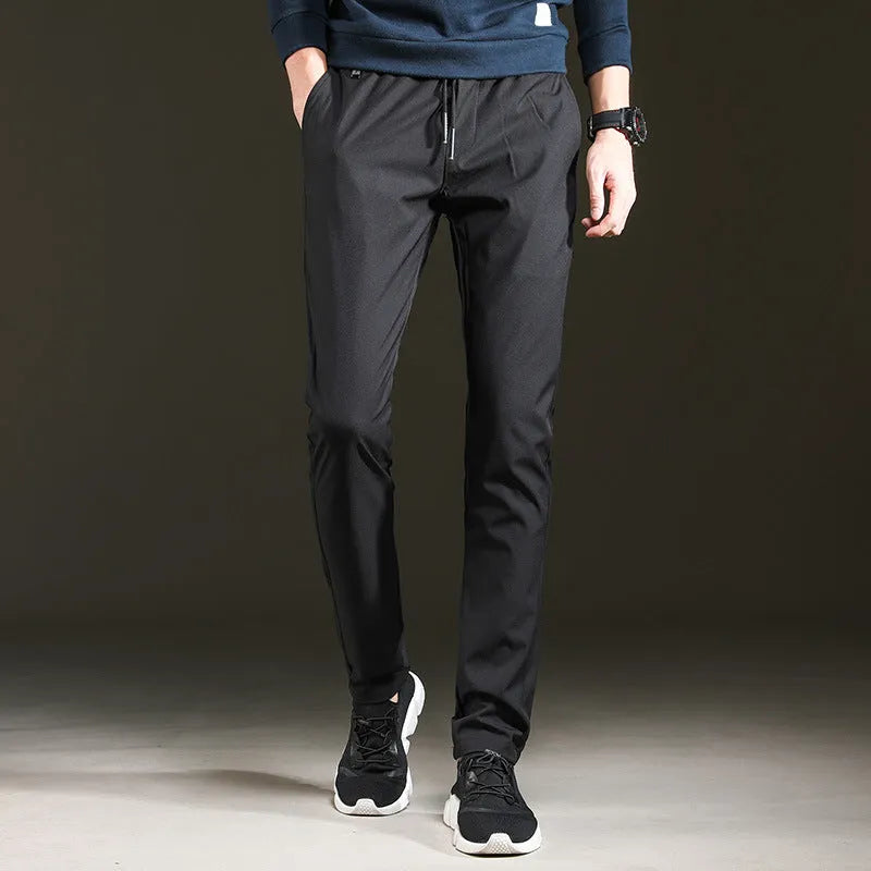 Men's slim cropped sweatpants in black with elasticated waist and relaxed fit, available in multiple sizes up to 5XL