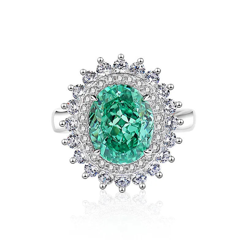 S925 sterling silver ring for women with a green emerald stone set using Palaibahao inlay and diamond accents.