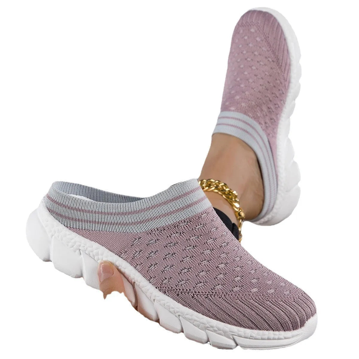 Women's black flyknit semi-slipper sock shoes with striped pattern and hollowed-out sewing lines on a lightweight sole.